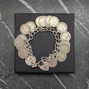 Vintage Sterling Silver Charm Bracelet With Heart Locket and Coin Charms